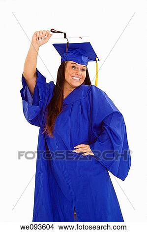 A female caucasian in navy blue graduation gown and very excited She is on a white background View Large Photo Image Picture - A female caucasian in navy blue graduation gown and very excited She is on a white background. Fotosearch