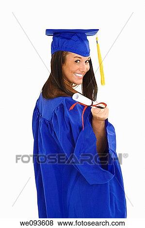 A female caucasian in navy blue graduation gown and very excited She is on a white background View Large Photo Image Stock Photo - A female caucasian in navy blue graduation gown and very excited She is on a white background. Fotosearch