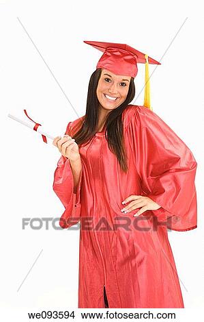 A female caucasian in red graduation gown and very excited She is on a white background View Large Photo Image Picture - A female caucasian in red graduation gown and very excited She is on a white background. Fotosearch