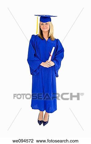 A female caucasian with blond hair standing in blue graduation gown and smiling She is on a white background View Large Photo Image Stock Image - A female caucasian with blond hair standing in blue graduation gown and smiling She is on a white background. Fotosearch