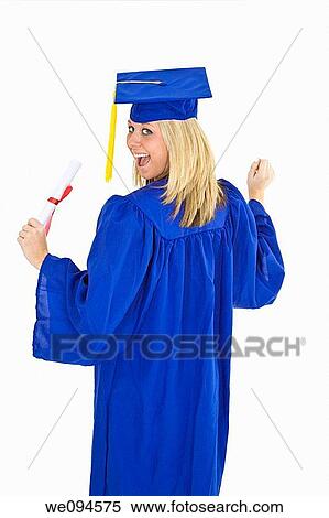 A female caucasian with blond hair standing in blue graduation gown and smiling She is on a white background View Large Photo Image Stock Photography - A female caucasian with blond hair standing in blue graduation gown and smiling She is on a white background. Fotosearch