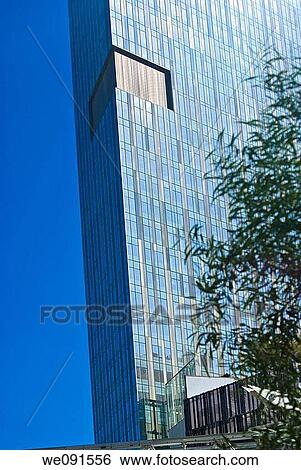 Stock Photograph - A high-rise hotel glistens against blue sky at CityCenter, Las Vegas, Nevada. Fotosearch