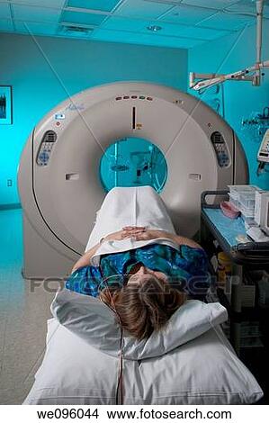 A patient having calcium score testing done at The Imaging Center Fort Collins, Colorado. The calcium score shows how much calcium and plaque has built up in the coronary arteries going to the heart. View Large Photo Image Picture - A patient having calcium score testing done at The Imaging Center Fort Collins, Colorado. The calcium score shows how much calcium and plaque has built up in the coronary arteries going to the heart.. Fotosearch