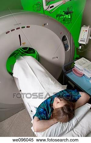A patient having calcium score testing done at The Imaging Center Fort Collins, Colorado. The calcium score shows how much calcium and plaque has built up in the coronary arteries going to the heart. View Large Photo Image Stock Photography - A patient having calcium score testing done at The Imaging Center Fort Collins, Colorado. The calcium score shows how much calcium and plaque has built up in the coronary arteries going to the heart.. Fotosearch