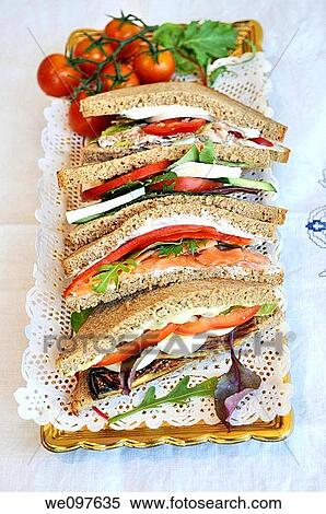 A plate of sandwiches: Eggplant, Salmon and cheese View Large Photo Image Stock Photography - A plate of sandwiches: Eggplant, Salmon and cheese. Fotosearch