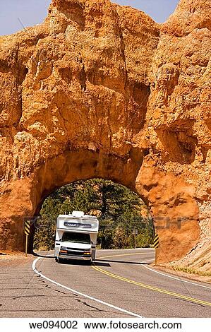 A recreational vehicle traveling on the open road View Large Photo Image Stock Image - A recreational vehicle traveling on the open road. Fotosearch