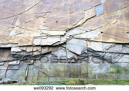 Stock Image - Abstract pattern of vertical layers of stone at Cape Enrage New Brunswick cliff face. Fotosearch