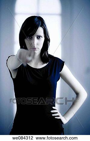 Stock Image - accusing, blue-toned, blue, accusation. Fotosearch