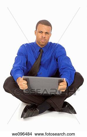 African American businessman setting on white background View Large Photo Image Picture - African American businessman setting on white background. Fotosearch