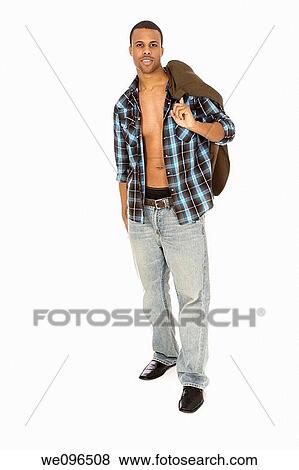 Stock Photo - African American male standing on a white background. Fotosearch