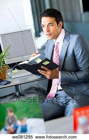 agenda, businessman, business, black hair, absorbed View Large Photo Image Stock Photography - agenda, businessman, business, black hair, absorbed. Fotosearch
