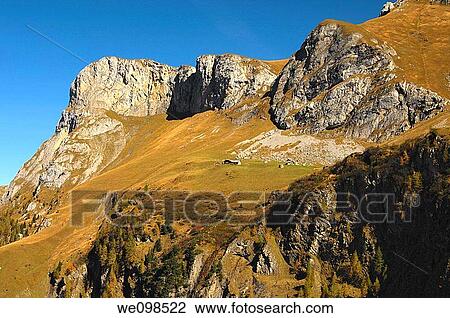 Stock Image - Alp Uesseri Gelten beneath Mt Follhore in the Gelten Valley, nature reserve Gelten-Iffigen, Bernese Oberland, Switzerland. Fotosearch