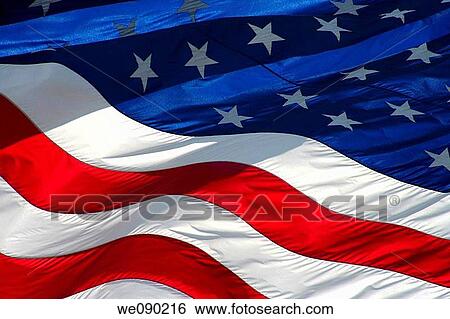american flag in the wind View Large Photo Image Stock Photograph - american flag in the wind. Fotosearch