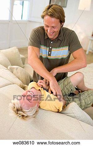 amusement, boy, blond, at-home, action View Large Photo Image Stock Image - amusement, boy, blond, at-home, action. Fotosearch