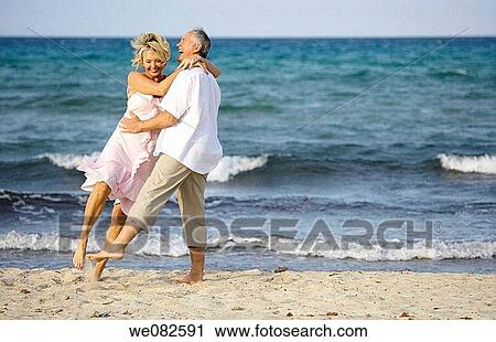 amusement, carefree, beach, barefoot, action View Large Photo Image Stock Image - amusement, carefree, beach, barefoot, action. Fotosearch