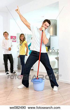 amusing, at-home, Arms raised, amusement View Large Photo Image Stock Image - amusing, at-home, Arms raised, amusement. Fotosearch