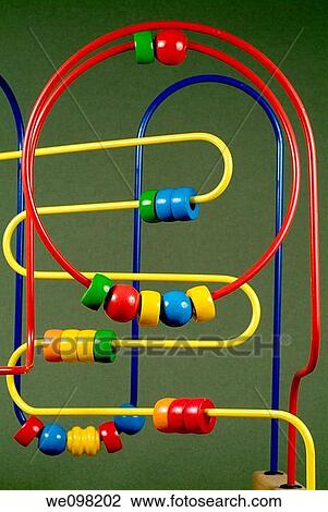 An abacus learning toy spirals View Large Photo Image Stock Image - An abacus learning toy spirals. Fotosearch