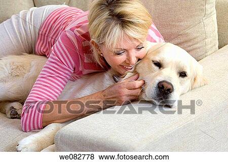 animal, caress, blond, at-home, affection View Large Photo Image Stock Photo - animal, caress, blond, at-home, affection. Fotosearch