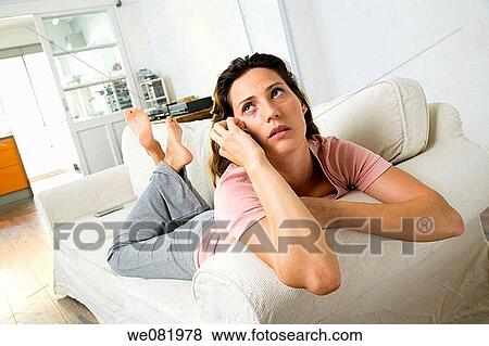 apartment, barefoot, at-home, absorbed View Large Photo Image Stock Photo - apartment, barefoot, at-home, absorbed. Fotosearch