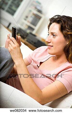 apartment, brown hair, at-home, addiction View Large Photo Image Picture - apartment, brown hair, at-home, addiction. Fotosearch
