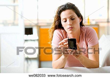 apartment, brown hair, at-home, addiction View Large Photo Image Stock Image - apartment, brown hair, at-home, addiction. Fotosearch