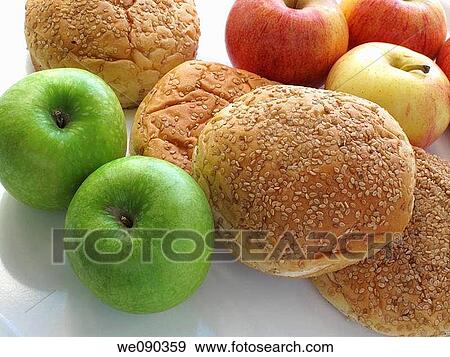 Apples and seeded bread View Large Photo Image Stock Photo - Apples and seeded bread. Fotosearch