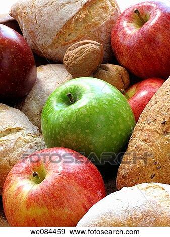 Apples, bread and nuts View Large Photo Image Stock Photo - Apples, bread and nuts. Fotosearch