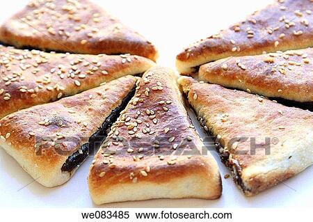 Arabic Pastry stuffed with date View Large Photo Image Stock Photography - Arabic Pastry stuffed with date. Fotosearch