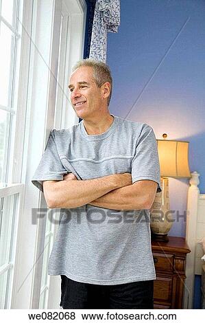 arms folded, blue eyes, bedroom, at-home, Arms crossed View Large Photo Image Stock Photo - arms folded, blue eyes, bedroom, at-home, Arms crossed. Fotosearch
