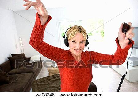 Arms raised, at-home, amusement View Large Photo Image Stock Image - Arms raised, at-home, amusement. Fotosearch