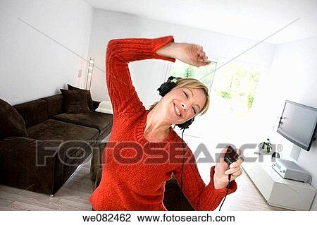 Arms raised, at-home, amusement View Large Photo Image Stock Image - Arms raised, at-home, amusement. Fotosearch