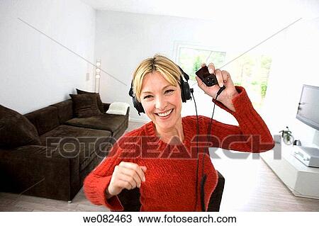 Arms raised, at-home, amusement View Large Photo Image Stock Image - Arms raised, at-home, amusement. Fotosearch
