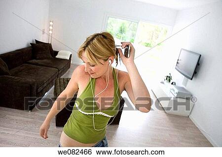 Arms raised, at-home, amusement View Large Photo Image Stock Photograph - Arms raised, at-home, amusement. Fotosearch