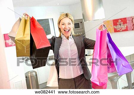 Arms raised, blond, bag, at-home, addiction View Large Photo Image Stock Image - Arms raised, blond, bag, at-home, addiction. Fotosearch