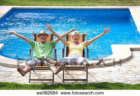 Arms raised, carefree, barefoot, Arms open View Large Photo Image Picture - Arms raised, carefree, barefoot, Arms open. Fotosearch