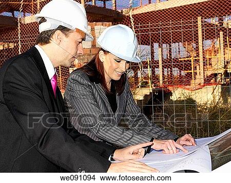 Arquitectos conprobando una obra View Large Photo Image Picture - Arquitectos conprobando una obra. Fotosearch