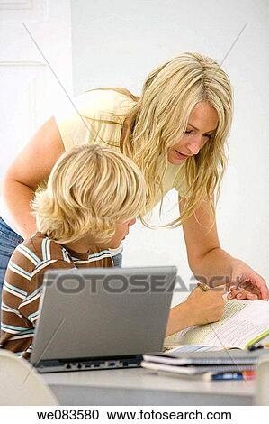 assistance, boy, book, at-home, aid View Large Photo Image Stock Image - assistance, boy, book, at-home, aid. Fotosearch