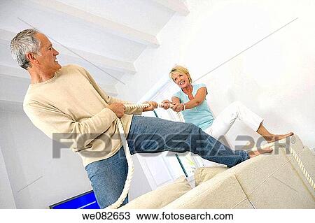at-home, Battle of the sexes, barefoot, angry View Large Photo Image Stock Image - at-home, Battle of the sexes, barefoot, angry. Fotosearch