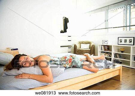 at-home, bed, barefoot, apartment View Large Photo Image Stock Image - at-home, bed, barefoot, apartment. Fotosearch
