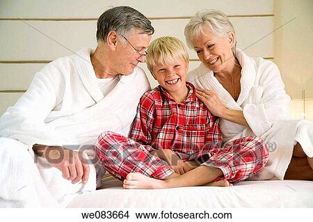 at-home, bed, bathrobe, barefoot, affection View Large Photo Image Picture - at-home, bed, bathrobe, barefoot, affection. Fotosearch
