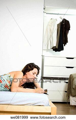 at-home, bedroom, bed, apartment View Large Photo Image Stock Photo - at-home, bedroom, bed, apartment. Fotosearch