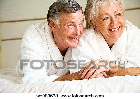 at-home, bedroom, bed, bathrobe, affection View Large Photo Image Stock Photo - at-home, bedroom, bed, bathrobe, affection. Fotosearch