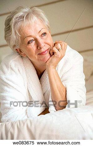at-home, bedroom, bed, bathrobe, absorbed View Large Photo Image Stock Photography - at-home, bedroom, bed, bathrobe, absorbed. Fotosearch