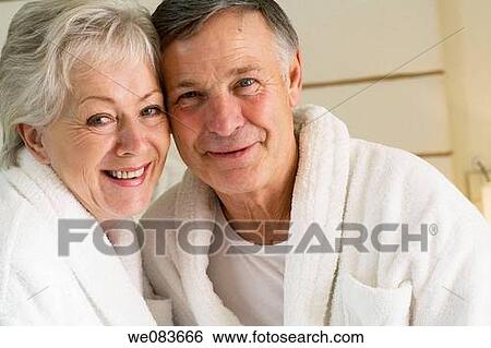 Stock Photograph - at-home, bond, bedroom, bathrobe, affection. Fotosearch