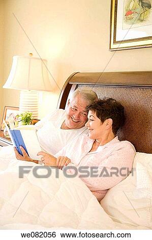 at-home, bond, bedroom, bed, affection View Large Photo Image Stock Photograph - at-home, bond, bedroom, bed, affection. Fotosearch