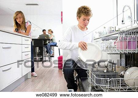 at-home, brother, boy, appliance View Large Photo Image Stock Photo - at-home, brother, boy, appliance. Fotosearch