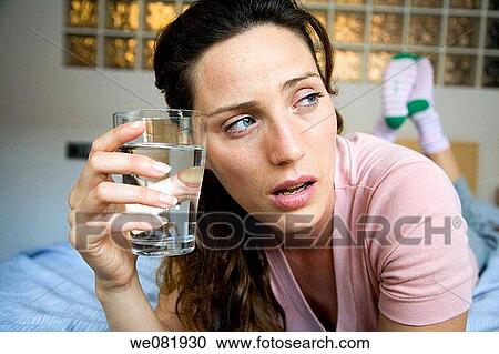 at-home, brown hair, blue eyes, bed, absorbed View Large Photo Image Stock Image - at-home, brown hair, blue eyes, bed, absorbed. Fotosearch