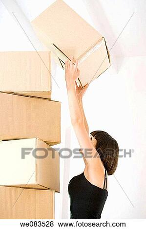 at-home, brunette, balance, Arms raised View Large Photo Image Stock Photo - at-home, brunette, balance, Arms raised. Fotosearch