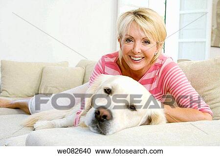 Stock Image - at-home, calm, blond, animal. Fotosearch