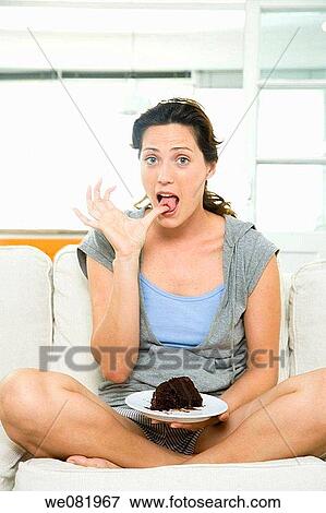 at-home, calorie, cake, barefoot, apartment View Large Photo Image Stock Photo - at-home, calorie, cake, barefoot, apartment. Fotosearch